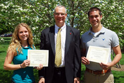 The University of Notre Dame’s theology faculty, led by its chair Professor John Cavadini, center, conferred two awards upon four students on April 26, including Caroline Murphy, left, a graduate from Saint Joseph’s High School and Justin Bartkus, right, from Marian High School. Murphy received the Gertrude Austin Marti Award, and Bartkus received the Rev. Joseph H. Cavanaugh, CSC, Award.