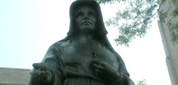 A statue honors St. Theodora Guérin on the Cathedral of the Immaculate Conception grounds at the location of the former academy.