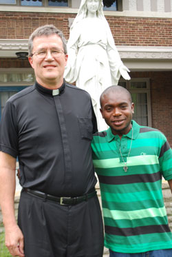 Father Bob Klemme and Fritzner Guerrier (Photo by Kevin Cullen)