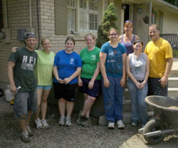 Joe Hardesty, above right, is joined by parishioners at St. John the Baptist Church in Newburgh, during a trip to Tennessee to help out after early May floods devastated the Nashville area. They include Kevin Halter, Sarah Woehler, Erin Hurm, Meghan Adamson, Megan Hardesty, Michelle Brown and Trisha Dunlap. He is the director of youth ministry at the Newburgh parish.