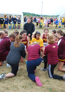 Teammates from Brebeuf Jesuit Preparatory School, Indianapolis, gather before a race at the first Indiana Catholic Cross Country Championships, held Sept. 11 at St. Theodore Guerin High School in Noblesville.
