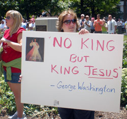 Maureen Devlin, a member of Mary, Queen of Peace Parish in Danville, displays a sign during the religious freedom rally on the grounds of the Indiana Statehouse in Indianapolis on June 8. (Photo by Mike Krokos)