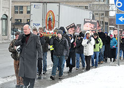 In this file photo, people stand in line to go to confession at Our Lady of the Most Holy Rosary Church in Indianapolis. From 6:30 p.m. to 8 pm. on April 2, priests will be available in churches across central and southern Indiana to celebrate the sacrament of penance with anyone who wishes to celebrate the sacrament and receive God’s mercy and forgiveness. (File photo by Sean Gallagher)