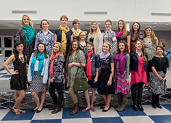 Young women from SS. Francis and Clare of Assisi Parish in Greenwood pose on Feb. 8 wearing clothes highlighted at a fashion show at the Indianapolis South Deanery faith community. Several events that day raised awareness of human trafficking. The clothes in the fashion show were designed and created by Cambodian women rescued from human trafficking. The events of the day were organized by parish leaders of pro-life, catechetical and other ministries. (Submitted photo)