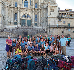 Camino pilgrims are all smiles after reaching their final destination: the Cathedral of St. James in northern Spain. (Submitted photo)
