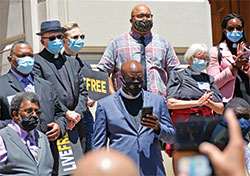 Leaders and members of many faiths gather on the steps of the Indiana Statehouse on May 31 for a peaceful protest organized by Faith in Indiana in response to the May 25 killing of George Floyd by police officers in Minneapolis. (Photo by Natalie Hoefer)