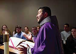 Conventual Franciscan Father Mario Serrano, vocations director for his order’s Our Lady of Consolation Province, which is based in Mount St. Francis in the New Albany Deanery, preaches during a March 8 Mass on the campus of the University of Texas El Paso in El Paso. (Submitted photo)