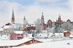 Spires of Holy Family Church and of the Sisters of St. Francis’ convent and chapels pierce the skyline of Oldenburg. (Photo courtesy of Holidays Under the Spires)
