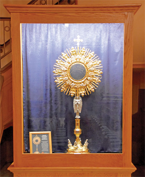 The monstrance from the National Eucharistic Congress held in Indianapolis in July was gifted to the Archdiocese of Indianapolis and, except for when on loan, is on display in SS. Peter and Paul Cathedral in Indianapolis. Blessed by Pope Francis, the monstrance, made in Guadalajara, Mexico, stands 4 feet, 5 inches tall and weighs more than 20 pounds. (Photo by Natalie Hoefer)