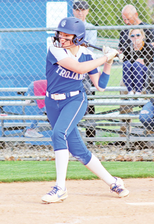 Anni Felts, a senior at Bishop Chatard High School in Indianapolis, swings at a pitch as a member of her school’s softball team. The school seeks to put faith at the heart of its 28 boys’ and girls’ athletic teams, in which some 75% of its students participate. (Submitted photo)