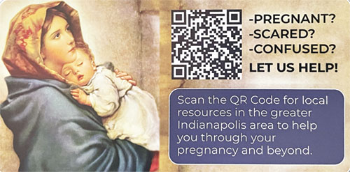 The Sanctity for Life committee of St. John the Evangelist Parish in Indianapolis places stickers with the above image on mirrors in bathrooms at the church and the surrounding area to share a list of local resources for pregnant and parenting moms that the team created through the Walking with Moms in Need process. (Submitted photo)