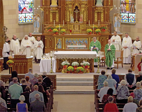 Archbishop Charles C. Thompson celebrates a Mass on Sept. 20 at Sacred Heart of Jesus Church in Indianapolis to mark the 150th anniversary of the founding of the faith community on the near southside of the city. (Submitted photo)