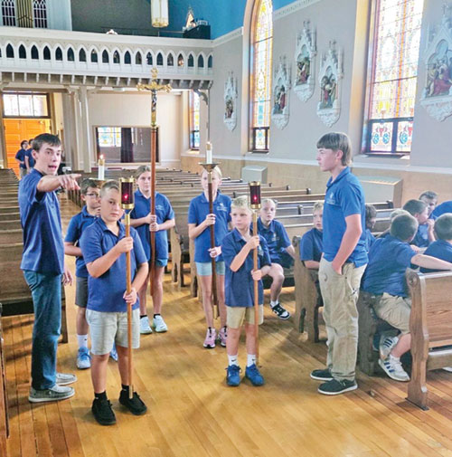 The embrace of the Catholic faith is an integral part of the education that students receive and share at St. Mary School in North Vernon, which was recently recognized as one of the first-ever schools to receive an Indiana Blue Ribbon School designation. (Submitted photo)