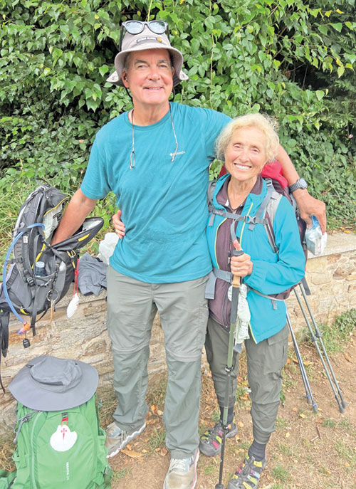 To celebrate his 70th birthday in July, Father John Meyer, pastor of St. Mary Parish in Greensburg, walked 500 miles on the Camino. His 80-year-old friend, Shirley Kloepfer, was among the friends and family members who joined him for the last leg of his journey. (Submitted photo)