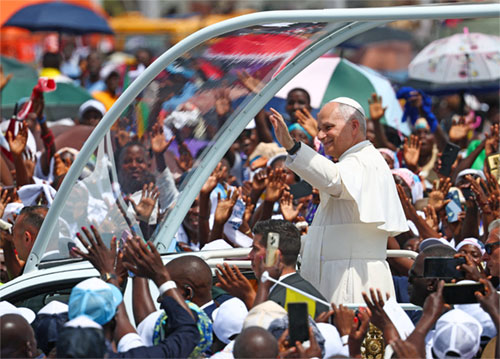 Pope Leo XIV waves as he arrives to celebrate Mass at Saurimo esplanade in northeastern Angola April 20, 2026. (OSV News photo/Guglielmo Mangiapane, Reuters)