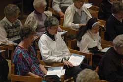 Benedictine Sisters Norma Gettelfinger, Maureen Therese Cooney and Mary Carol Messmer pray Morning Prayer on Dec. 12 in the community’s chapel with other members and guests of Our Lady of Grace Monastery in Beech Grove .