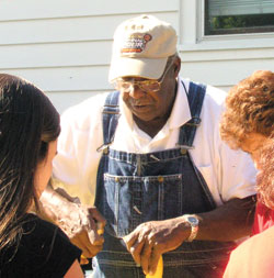 For Lucious Newsom, helping the poor involved respecting their dignity. When companies donated food to help the poor, Newsom set it up so people could choose what they wanted to take. Newsom died on Aug. 18 after a battle with cancer. (File photo by John Shaughnessy) 