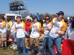 Youths from the Archdiocese of Indianapolis have fun showing their dance moves as they wait in the sunshine on April 19 for the arrival of Pope Benedict XVI at a youth and seminarian rally in Yonkers, N.Y. (Submitted photo) 