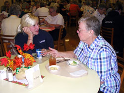 Oldenburg Academy of the Immaculate Conception senior Julie Martin of Aurora, left, listens to Franciscan Sister Ruthann Boyle. They have gotten to know each other over the past four years through the academy’s Adopt-a-Sis program. (Submitted photo) 