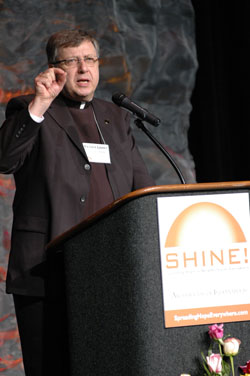 Father Larry Snyder, president of Catholic Charities USA, delivers his keynote address at the “Spreading Hope in Neighborhoods Everywhere” conference on Oct. 1 in Indianapolis. (Photo by Mary Ann Wyand)
