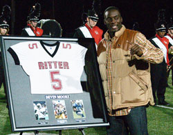 Indianapolis Colts running back and kick returner Devin Moore poses on Oct. 15 at St. Vincent Health Field at Marian University in Indianapolis during a Cardinal Ritter Jr./Sr. High School football game. The Indianapolis West Deanery interparochial high school retired his number that night. Moore graduated from Cardinal Ritter in 2004, and was a member of its 2003 state champion football team. (Submitted photo/Steve Rettig)