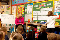 Jacque Singleton teaches a class of first-grade students on Dec. 8, 2010, at St. Anthony School in Clarksville. The “United Catholic Appeal: Christ Our Hope” helps support the ministry of the archdiocese’s Office of Catholic Education, which helps Catholic schools across central and southern Indiana provide a high quality education to their students. (Submitted photo)