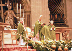 Cardinal Tarcisio Bertone, center, Vatican secretary of state, ritually lays hands on the head of then-Redemptorist Father Joseph Tobin during an Oct. 9, 2010, Mass in which Father Tobin was ordained an archbishop at St. Peter’s Basilica at the Vatican. Archbishop Tobin received his priestly formation at Mount St. Alphonsus, the former Redemptorist seminary and later retreat center in Esopus, N.Y., which was closed earlier this year by the congregation. (Submitted photo)