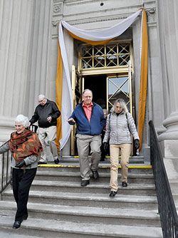 Yellow and white bunting decorates the main doors of SS. Peter and Paul Cathedral in Indianapolis after a March 14 Mass that celebrated the election of Cardinal Jorge Mario Bergoglio of Buenos Aires as Pope Francis. The flag of Vatican City features yellow and white. (Photo by Sean Gallagher)