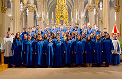 The University of Notre Dame Liturgical Choir poses in the Basilica of the Sacred Heart on the university’s northern Indiana campus. The choir will perform a concert at 6:30 p.m. on May 12 at SS. Peter and Paul Cathedral, 1347 N. Meridian St., in Indianapolis. (Photo courtesy of the University of Notre Dame)