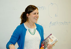 First-year teacher Mary Wickert shows her joy when one of her students at St. Philip Neri School in Indianapolis gives the right answer in science class. (Photo by John Shaughnessy)