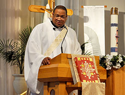 Transitional Deacon Douglas Hunter delivers a homily at St. Monica Church in Indianapolis on April 18, 2015. He and five others will be ordained to the priesthood on June 25. (Submitted photo by Mel Ullrich)