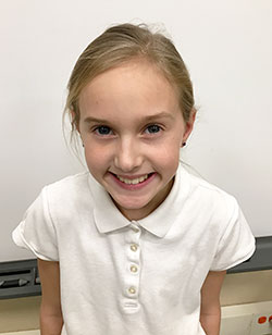 Gracie Ripperger’s brilliant smile reflects her love for her school—St. Michael School in Brookville. (Submitted photo) 