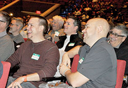 Kyle Vollmer, left, and his brother Will Vollmer laugh during a presentation by Dr. Ray Guarendi on March 4. Kyle is a member of St. John the Baptist Parish in Harrison, Ohio, in the Cincinnati Archdiocese. Will is a member of All Saints Parish in Dearborn County, which organized the conference. (Photo by Sean Gallagher)