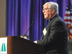 Bishop Frank J. Dewane of Venice, Fla., speaks on June 15 during the U.S. Conference of Catholic Bishops’ annual spring assembly in Indianapolis. (Photo by Sean Gallagher)