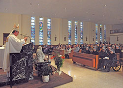 Archbishop Christophe Pierre, apostolic nuncio to the U.S., preaches during a March 19 Mass in the chapel of the St. Augustine Home for the Aged in Indianapolis. The liturgy marked the 150th anniversary of the start of ministry in the U.S. of the Little Sisters of the Poor, who operate the retirement facility. (Photo by Sean Gallagher)