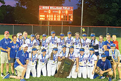 The players and coaches of the softball team of Roncalli High School in Indianapolis are all smiles as they celebrate their Indiana High School Athletic Association Class 4A state championship on June 12. (Submitted photo) 