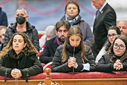 People pay their respects at the body of Pope Benedict XVI in St. Peter’s Basilica at the Vatican on Jan. 3. (CNS photo/Paul Haring)