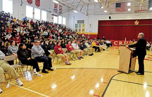 Bishop Joseph N. Perry, a retired auxiliary bishop of the Archdiocese of Chicago, right, speaks during a Black History Month event on Feb. 18 at Father Thomas Scecina Memorial High School in Indianapolis about Venerable August Tolton, the first Black priest in the U.S. (Photo by Sean Gallagher)