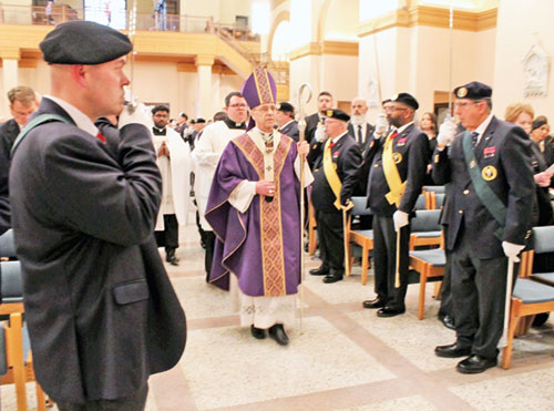 Archbishop Charles C. Thompson processes toward the altar of SS. Peter and Paul Cathedral in Indianapolis on March 22 to celebrate Mass with members of the Father Edward F. Sorin Province (named after the first president of the University of Notre Dame) of the Indiana State Council of the Knights of Columbus. (Submitted photos by Steve Lutz)