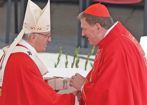 Pope Francis and Cardinal Joseph W. Tobin of Newark, N.J., share a moment of joy in 2017 when the pope gave the former archbishop of Indianapolis his pallium—a circular band made from lamb’s wool that symbolized Cardinal Tobin’s role as the shepherd of the Archdiocese of Newark and his communion with the pope. (CNS photo/Paul Haring)