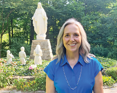 In her new role as the director of the archdiocese’s Office of Retreat and Renewal Ministry, Sandi Patel oversees Our Lady of Fatima Retreat House in Indianapolis, where she draws faith and strength from the Blessed Mother. (Photo by John Shaughnessy)