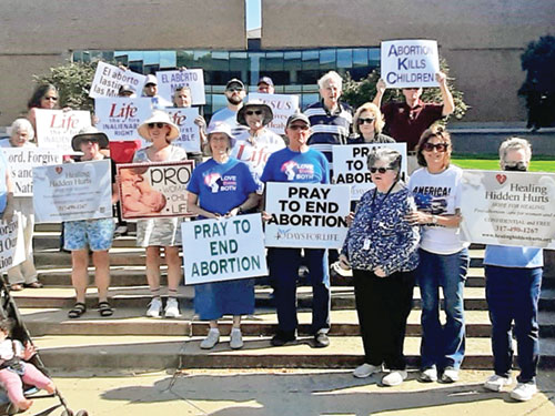 Those taking part in the Life Chain event in Columbus pose for a photo on Oct. 6, 2024. (Submitted photo)