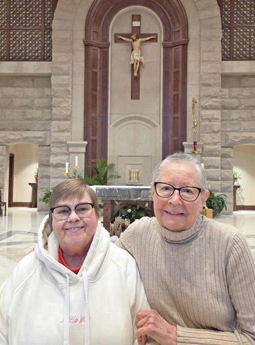 An amazing gift of friendship between Dr. Lynell Chamberlain, left, and Elizabeth Yetter has its roots in their shared faith in God. The friends pose for a recent photo at St. John Paul II Church in Sellersburg. (Submitted photo)