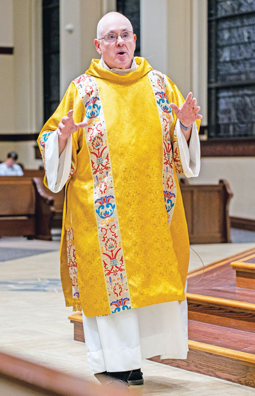 Deacon William Tribbey preaches during an Easter Vigil Mass celebrated on April 4 at St. John Paul II Church in Sellersburg. The challenge of living his Catholic faith in Saudi Arabia some 30 years ago still shapes his approach to ordained life and ministry. (Submitted photo)