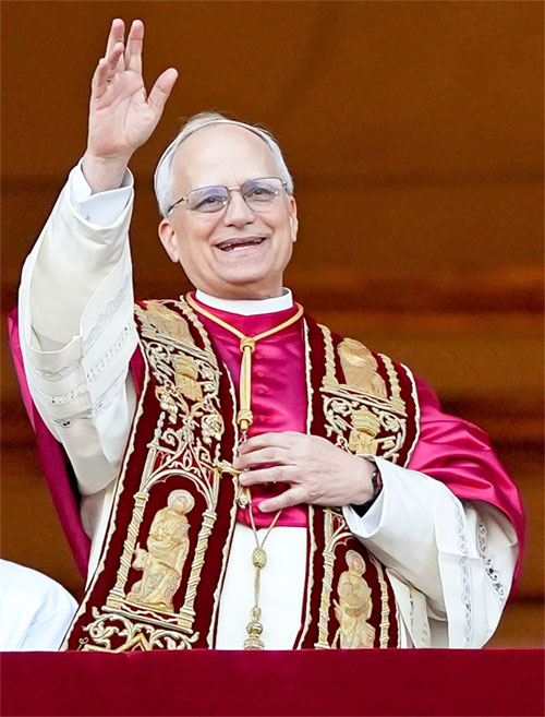 Cardinal Robert Francis Prevost, who has chosen the papal name Leo XIV, appears on the central balcony of St. Peter's Basilica at the Vatican May 8, 2025, following his election during the conclave. He is the first American pope in history. (OSV News photo/Remo Casilli, Reuters)