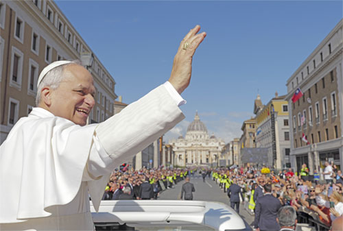 Pope Leo XIV receives the fisherman's ring, symbolizing his role as successor to St. Peter, from Filipino Cardinal Luis Antonio Tagle during the pope's inauguration Mass in St. Peter's Square May 18, 2025. (CNS photo/Vatican Media)