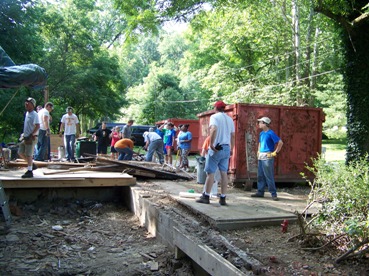 Volunteers taking a break at home site