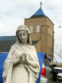 Tornado damage and statue of Mary