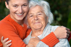 Young woman and elderly woman