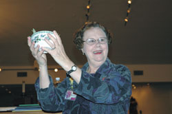 Mercy Sister Mary Ruth Broz of Chicago holds a bowl of sage on March 3 as she discusses the wisdom that women gain from the experiences of aging. She was the keynote speaker for St. Christopher Parish’s fifth annual Catholic Women’s Conference in Indianapolis.